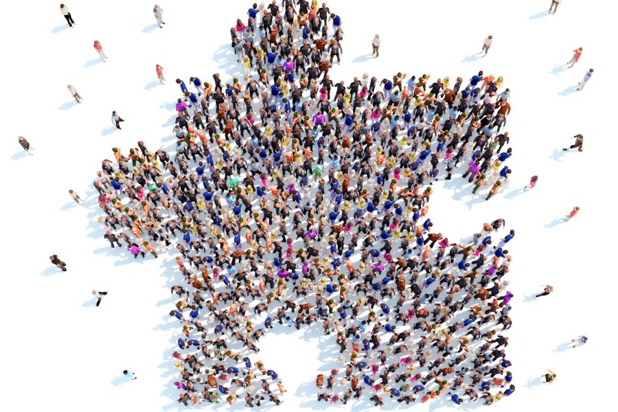 Large group of people in the form of a puzzle. White background.